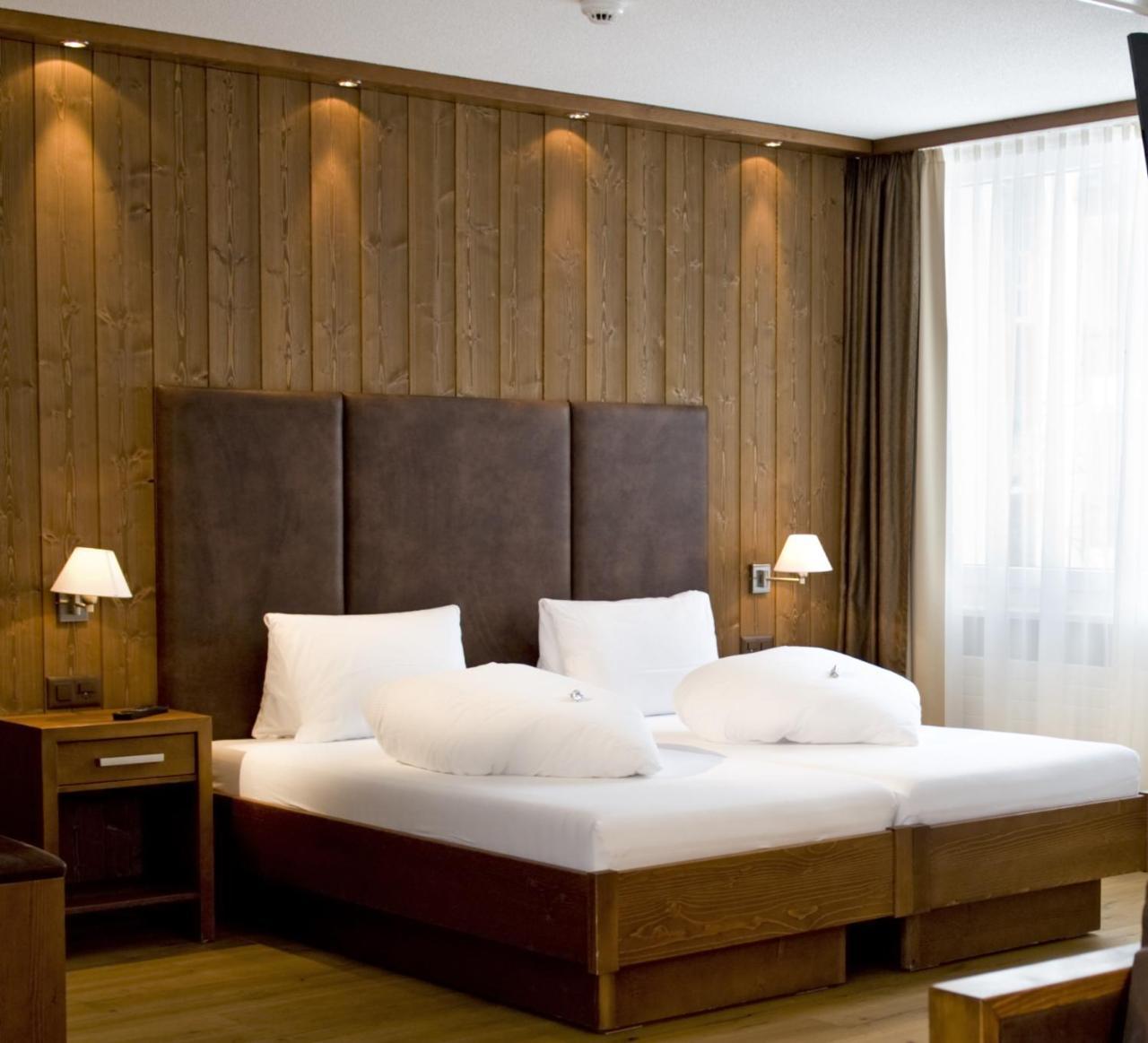 Hotel Quellenhof Лойкербад Экстерьер фото